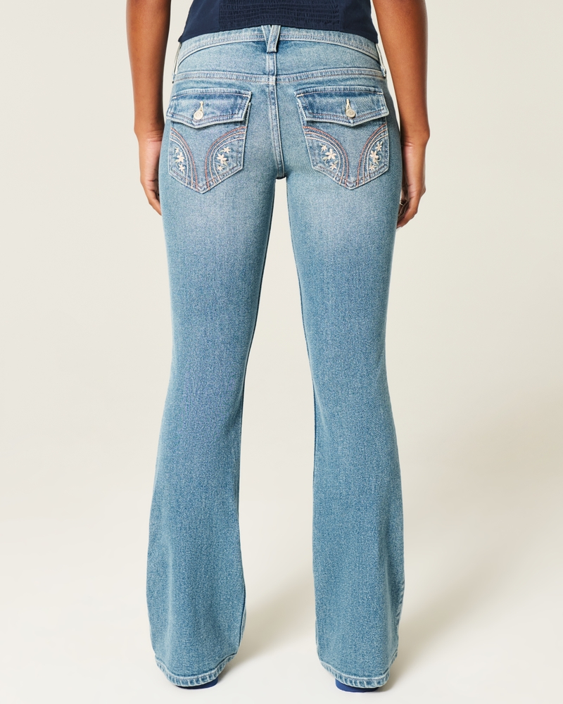 hüftig geschnittene tief gewaschene bootcut-jeans mit stickereien