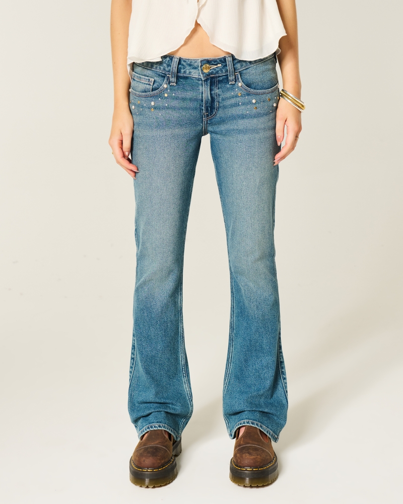 hüftig geschnittene tief gewaschene bootcut-jeans mit stickereien