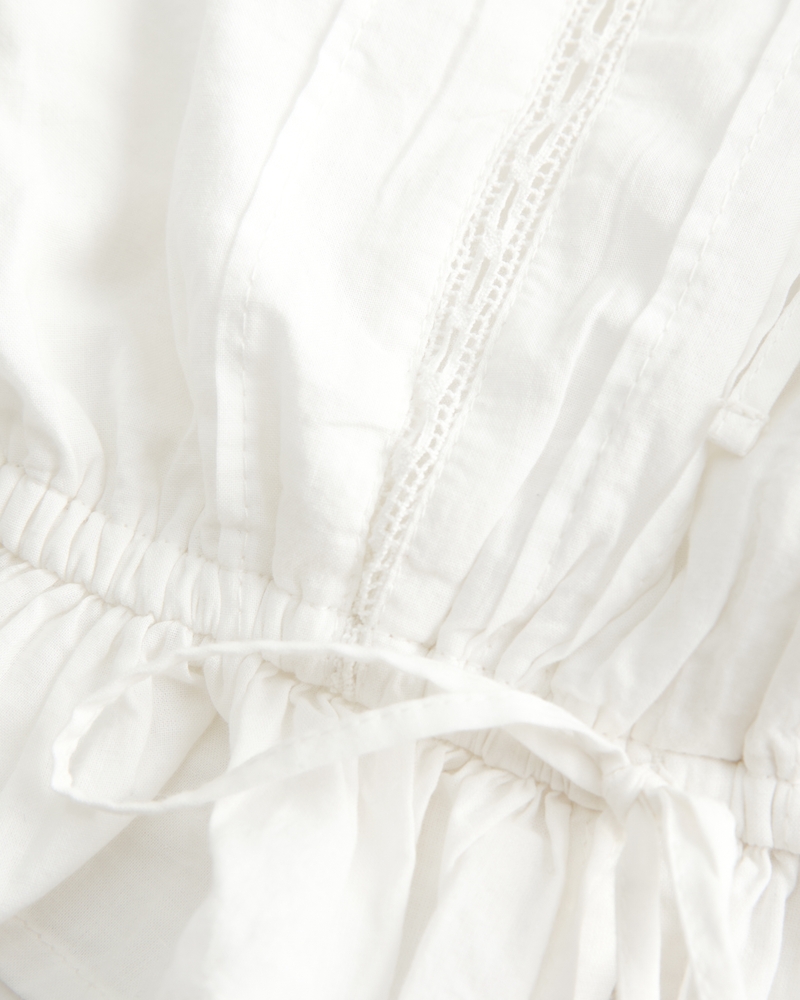 locker sitzendes kurzes trägerloses bustier-top mit spitzenbesatz