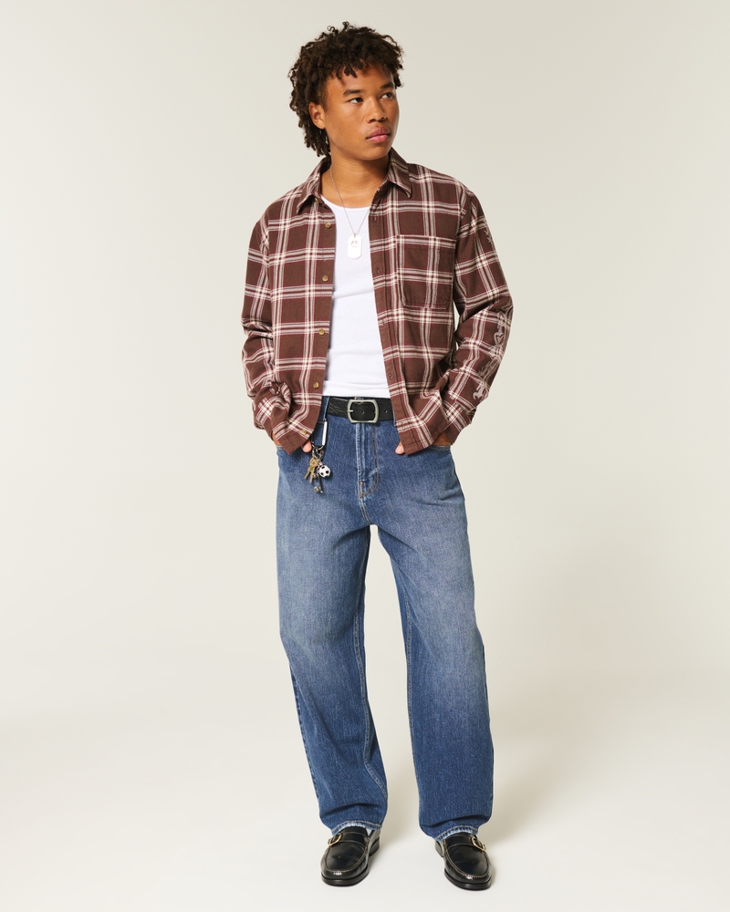 camouflage-skateboard-jeans locker sitzend malerjeans