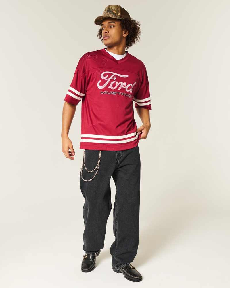 camouflage-skateboard-jeans locker sitzend malerjeans