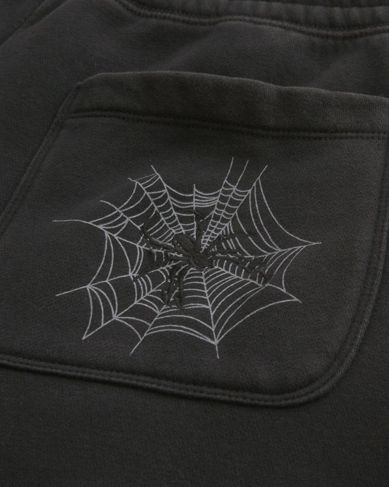 tasche mit spinnenstickerei locker sitzende jogginghose
