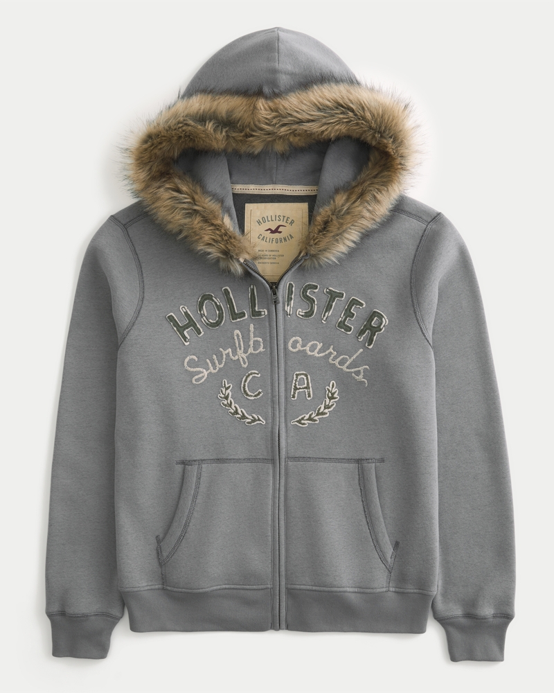 kapuzenpullover mit reißverschluss und logo besetzt mit kunstpelzbesatz und reißverschluss logo-besatz aus kunstpelz